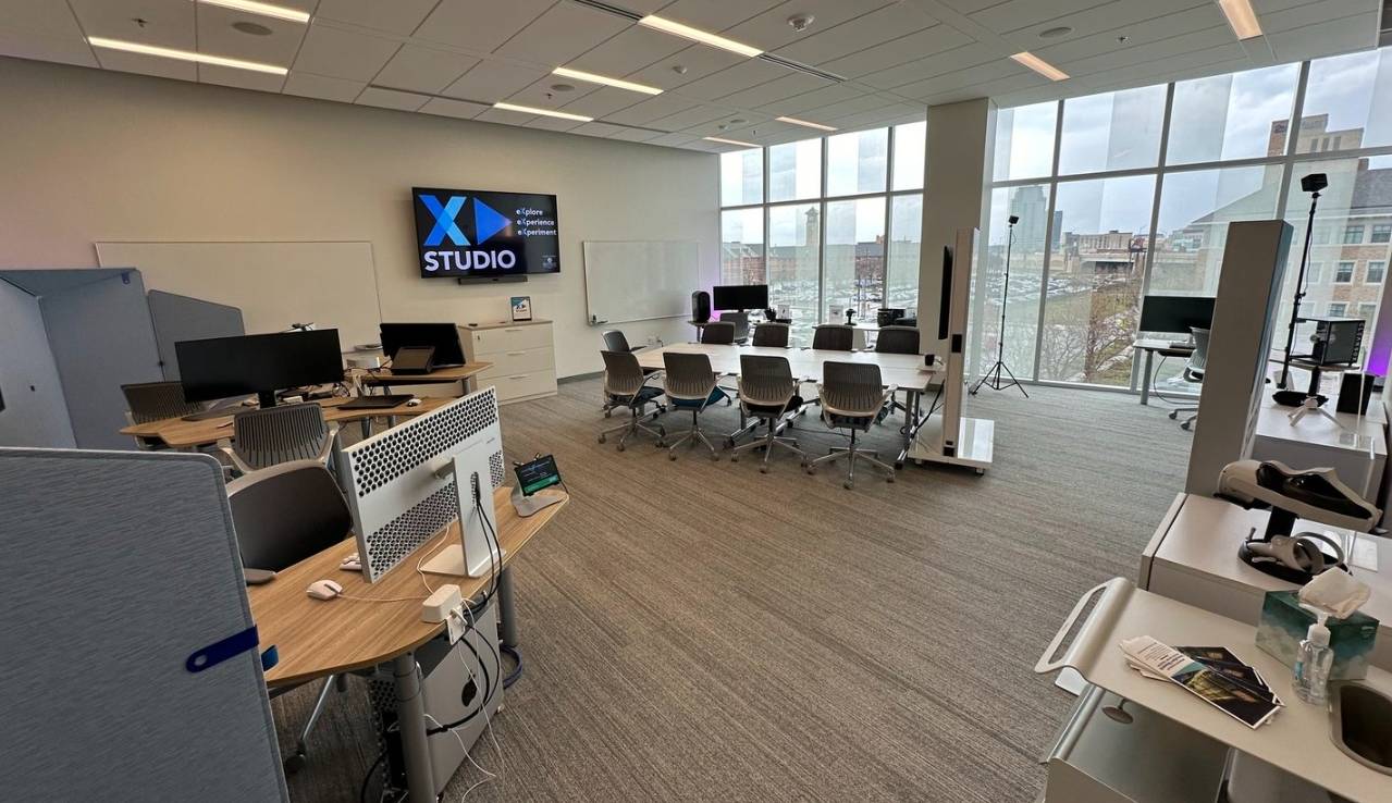 X&#62;STUDIO Space in Consumers Energy includes 2 Breakout Tables and 3 Display Screens